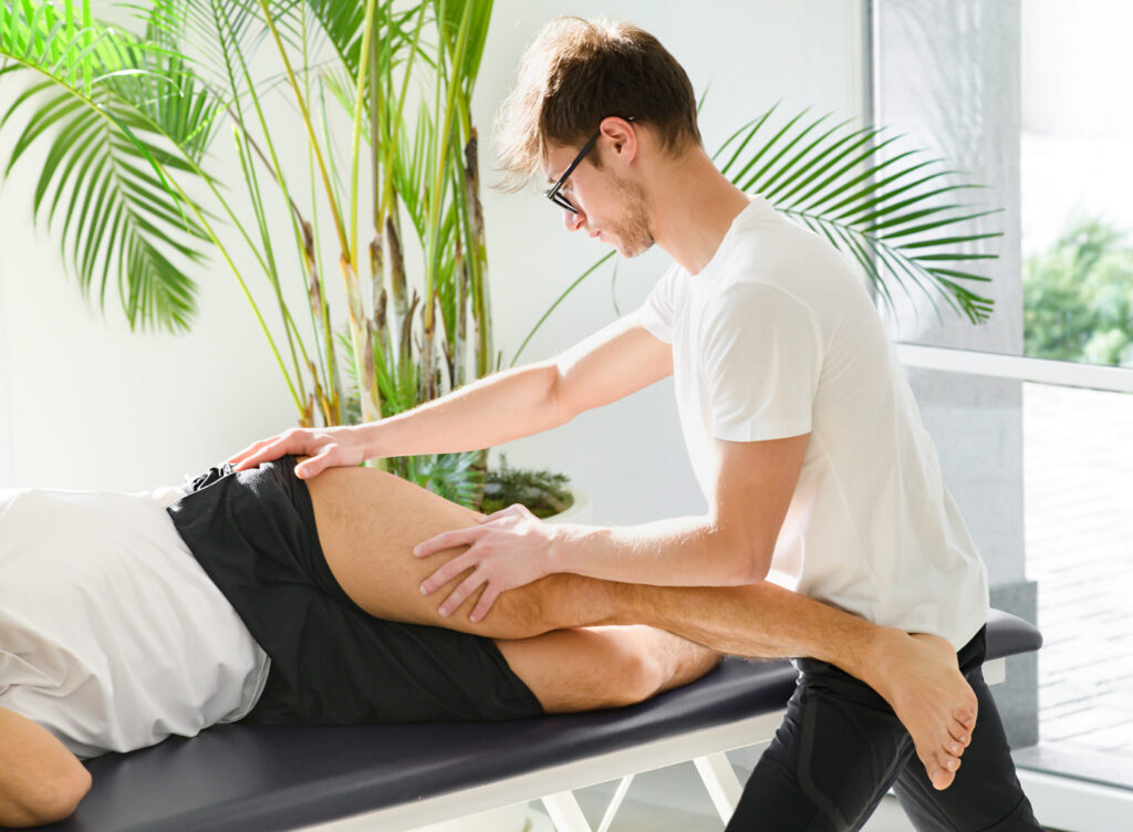 man receiving leg massage in physical therapy sess 2026 03 24 04 58 41 utc