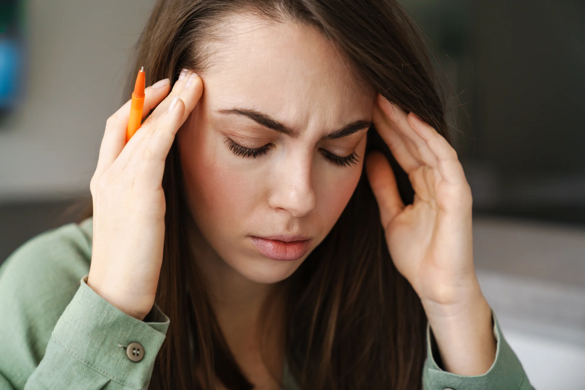 woman feeling anxious with hands on head 2026 03 20 02 57 39 utc